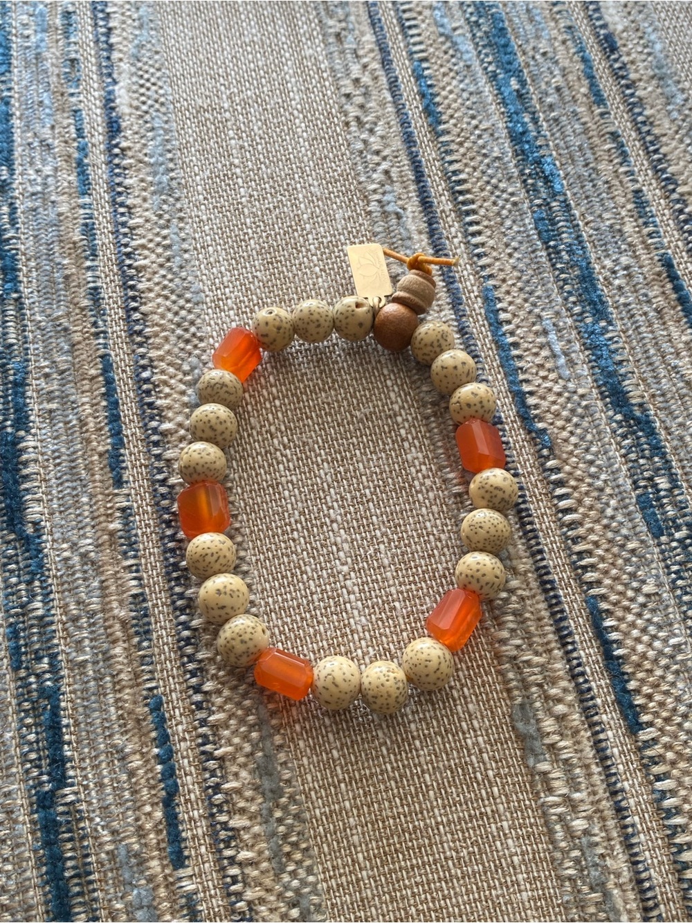 Judith Bright Orange and Cream Beaded Stretch Bracelet